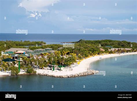 The Aerial View Of Empty Mahogany Bay Beach On Roatan Island Before The