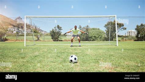 Goalkeeper Soccer Field And Sports Man Ready In Penalty Kick