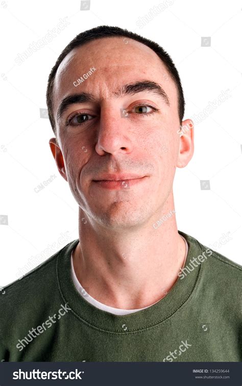 caucasian male headshot looking forward his head tilted back with a cocky expression on his