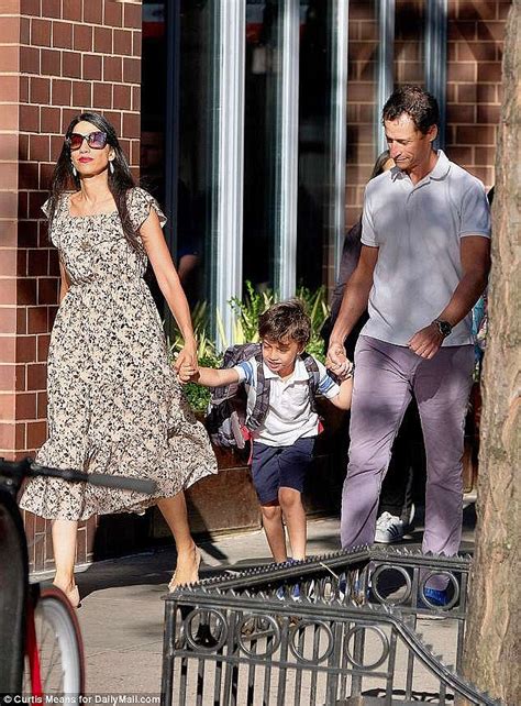 Huma Abedin Carries Her Son Home From School In New York