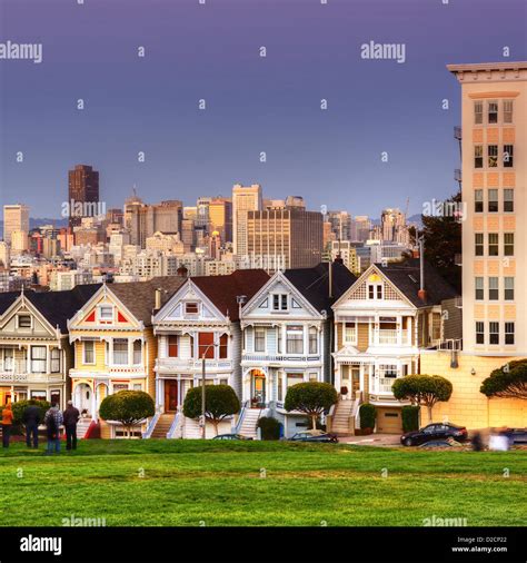 The Painted Ladies Of San Francisco California Sit Glowing Amid The