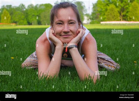 Young Woman Sitting In Yoga Pose Meditation Outdoors Stock Photo Alamy