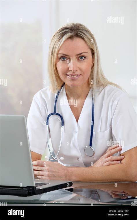 Beautiful Blond Nurse At Work Stock Photo Alamy
