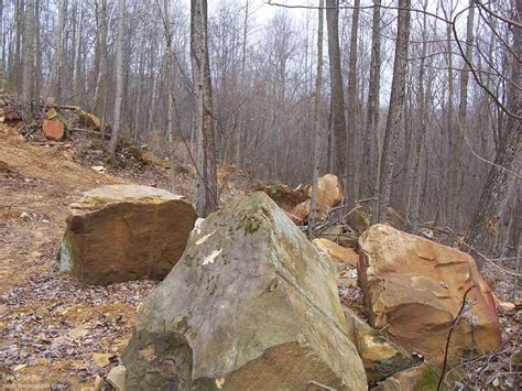 Fire pit rocks must be laid on a layer of small sized lava rock for best results. rock-farm-ii-001-fireboulder-fire-boulders-firepits ...