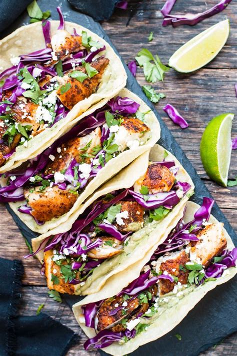 This recipe for fish tacos is seasoned fish layered with cabbage, avocado, pico de gallo and a creamy sauce, all tucked inside warm corn tortillas. Blackened Fish Tacos with Avocado Sauce - Evolving Table ...