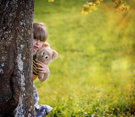 Girl Hiding Behind Tree With Teddy Free Image Download
