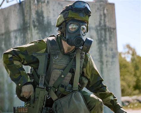 Swedish Cbrn Soldier Having Just Donned His Protective Mask During A