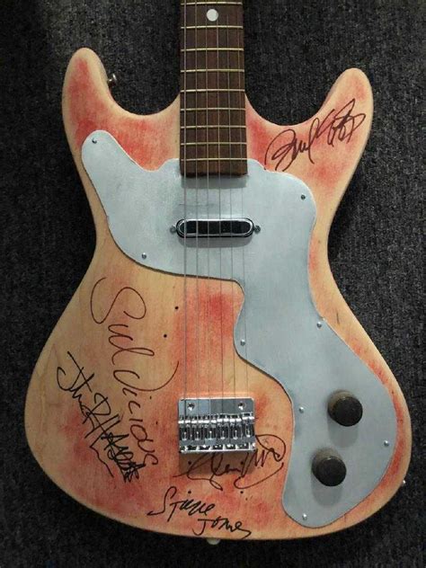The Sex Pistols Signed Guitar