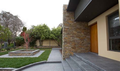 Artisan Exterior Organic Dry Stack And Grouted Stone Cladding