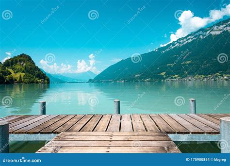 Majestic Lake With Clear Turquoise Water Wooden Pier Brienz Lake In