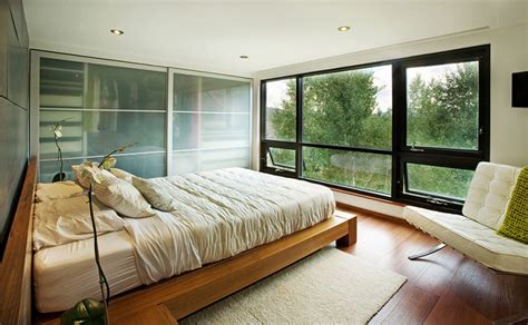 20 Contemporary Bedrooms With A Beautiful Outdoor View From Glass