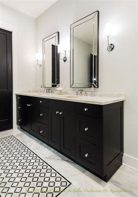 Beautiful Black Vanities With Marble Tops For This Master Bathroom In
