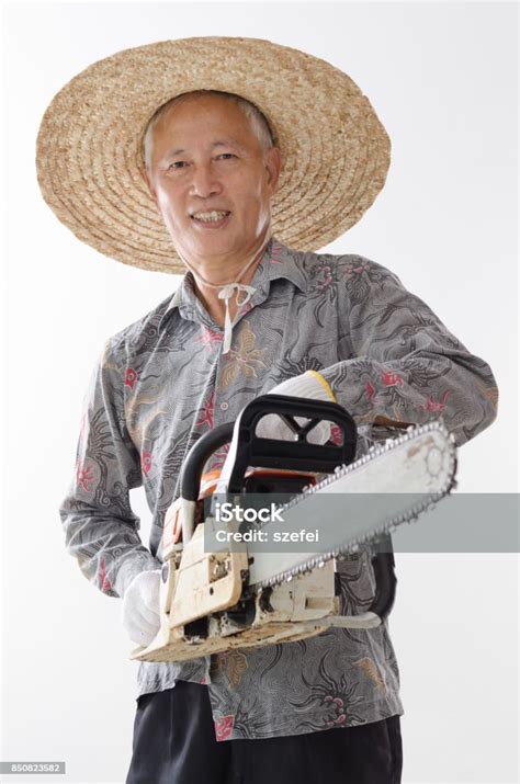 Asian Old Man Holding Chainsaw Stock Photo Download Image Now Adult