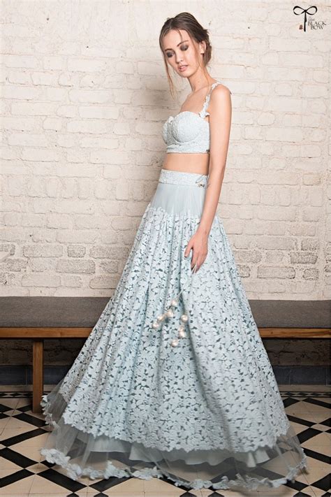 Powder Blue Crop And Tulle Lehenga Also Comes With A Gray Organza