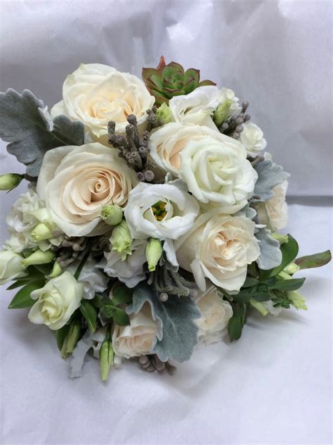 Lush Wedding Bouquet With Lovely Textures With Cream Roses White