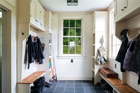 The door from our garage opens up into this small foyer which has doors to a laundry room, coat closet, and a powder room. Mud room | Vansant, Mud room entry, House design