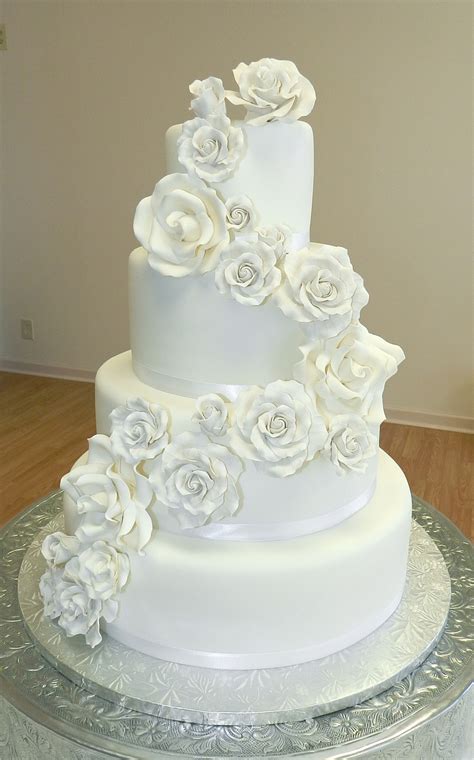 Here are some designs to inspire you. White Roses Wedding Cake - CakeCentral.com