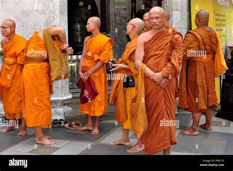 Chiang Mai Thailand A Group Of Monks With Shaved Heads Dressed In