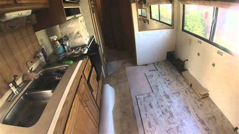 How to level a slide out on a camper. RV FLOOR REPLACEMENT MAUI WHITEWASH - YouTube