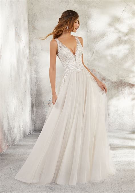 While you might find the lacey boho dress of your dreams, if trend alert: Leonita Wedding Dress | Style 5681 | Morilee