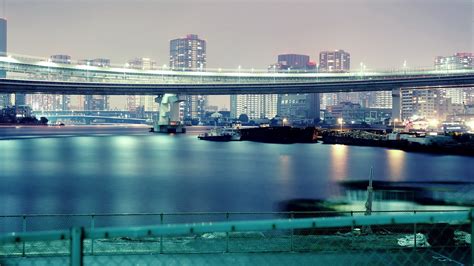 Photo Of Bridge Near In City Under Gray Sky Hd Wallpaper Wallpaper Flare