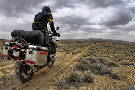An adventure bike (say klr) dual sport tires, rerouted exhaust, maybe i'll draw something up, side shocks on the rear with remote reservoir (did i hear ohlins i hear you but i think you are starting off with too heavy of a bike, same train of thought but starting with a dyna (switchback!?!?) might be the way to go, 100#'s. ADVRider: The Adventure Bike Forum