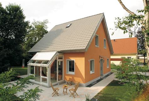 Erleben sie das wohngefühl und die besonderen eigenschaften unserer massiven fertighäuser im fränkischen schlüsselfeld. Haus ICON 3 mit Wintergarten - Dennert Massivhaus ...