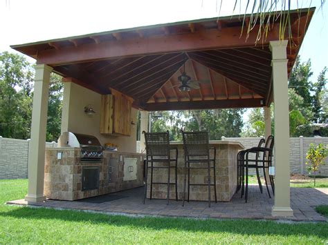 A full roof, as used here, is one option; New Orleans Outdoor Kitchens Contractor | Custom Outdoor ...