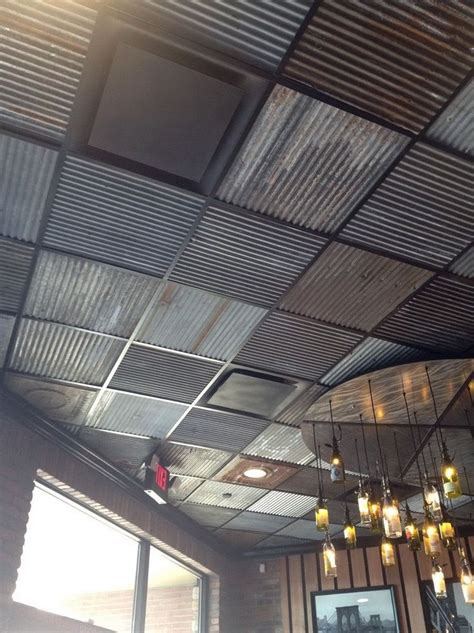 A dropped ceiling is a secondary ceiling, hung below the main (structural) ceiling. Corrugated Metal Drop Ceiling Tiles Ceilling ...