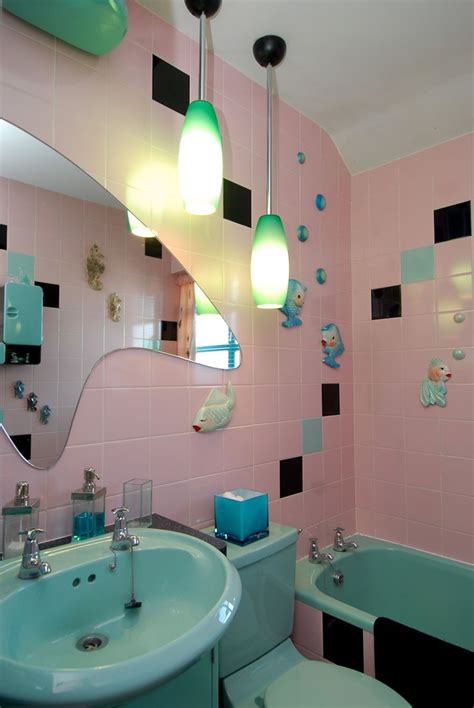 With three different shades of pink, the bathroom's look is completed with an array of antique décor. Vintage - Retro - Mid-Century Modern Pink and Aqua ...