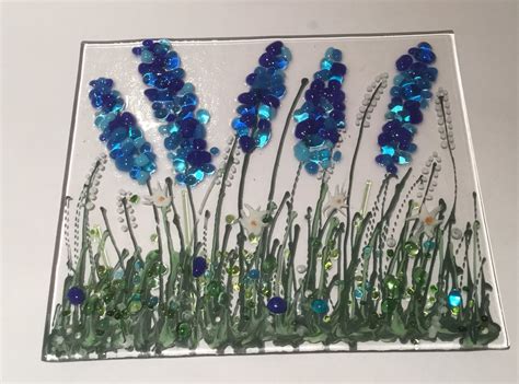 We have the most colorful tile on the market. Fused glass flowers | Glass fusion ideas, Fused glass ...