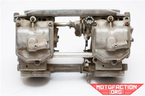 To clean a motorcycle carburetor without removing it, you'll need to remove the bowls at the bottom of the carburetor. How to clean the outside of the carburetors - Honda CB250N ...