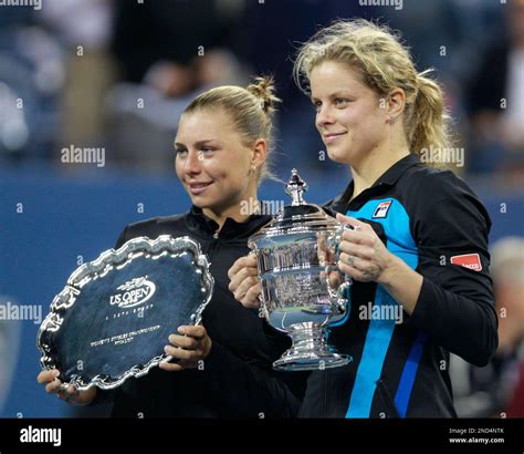 Kim Clijsters Left Of Belgium Holds The Championship Trophy And Vera
