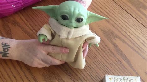 Showcasing The Animatronic Baby Yoda Dinosaur Stuffed Animal Teddy