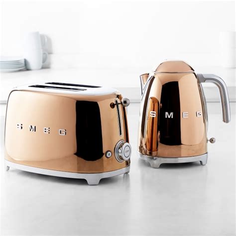 Sliced bread, thick farmhouse loaves, artisan breads, baguettes, or bagels each toasted just the way you want. SMEG Rose Gold Kitchen Appliances | Apartment Therapy
