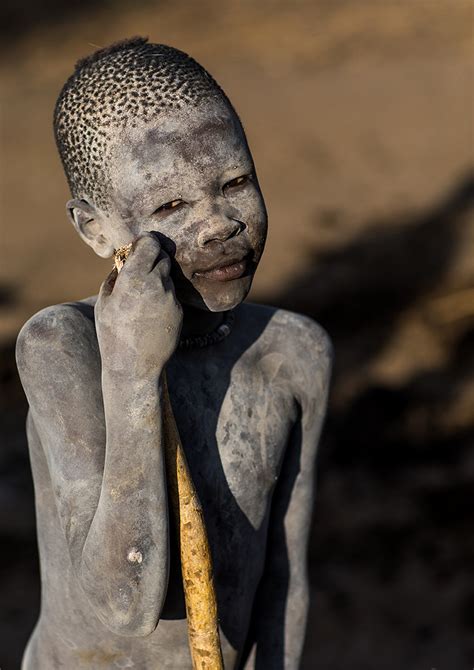 A Mundari Tribe Boy Covered In Ash To Repel Flies And Mosq Flickr