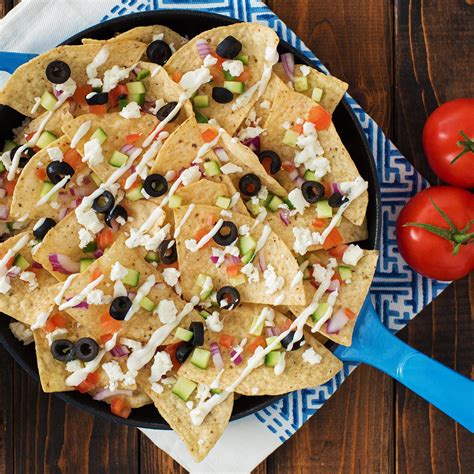 Grab some tostitos chips and dips and let's party. Gridiron Greek Nachos | Tostitos