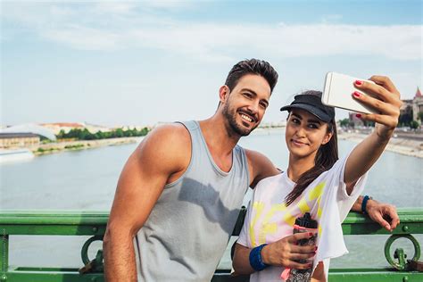 Couple In Fitness Clothes Taking A Selfie By Lumina