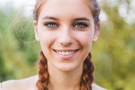 Beautiful Young Redhead With Braids Smiling At Camera By Giorgio Magini