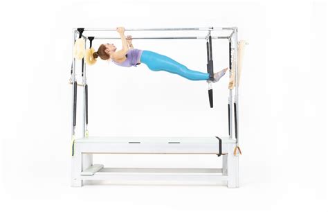 Hanging Pull Up With Trapeze On The Cadillac Online Pilates Classes