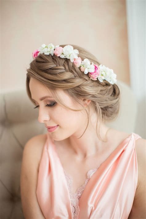 Tuck the end of the braid underneath to create an easy wedding hairstyle that stays off your shoulders and neck. 10 of the best half up half down wedding hairstyles with ...