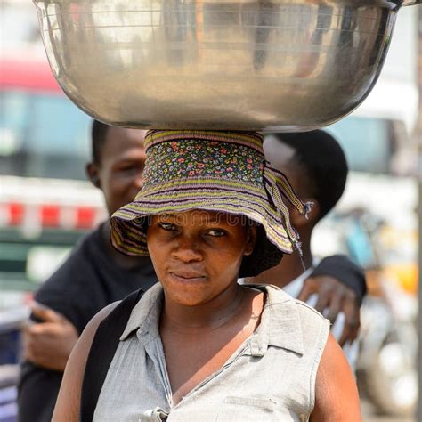unidentified ghanaian woman carries a basin on her head at the editorial stock image image of