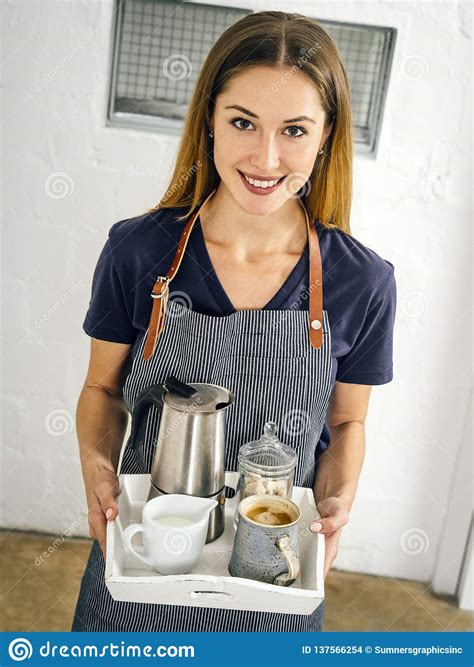 Beautiful Smiling Woman Serving Coffee Stock Photo - Image of smile, cheerful: 137566254