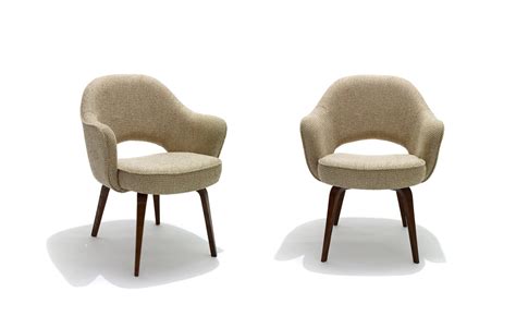 Montage's saarinen executive chairs are available in any quantity and can be upholstered using our wide selection fabrics, leathers, and com. Saarinen Executive Arm Chair With Wood Legs - hivemodern.com