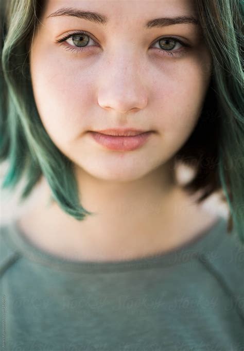 Close Up Of A Cute Teen Girl With Green Hair By Stocksy Contributor