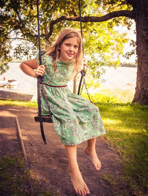 Young Girl On A Swing High Quality People Images ~ Creative Market