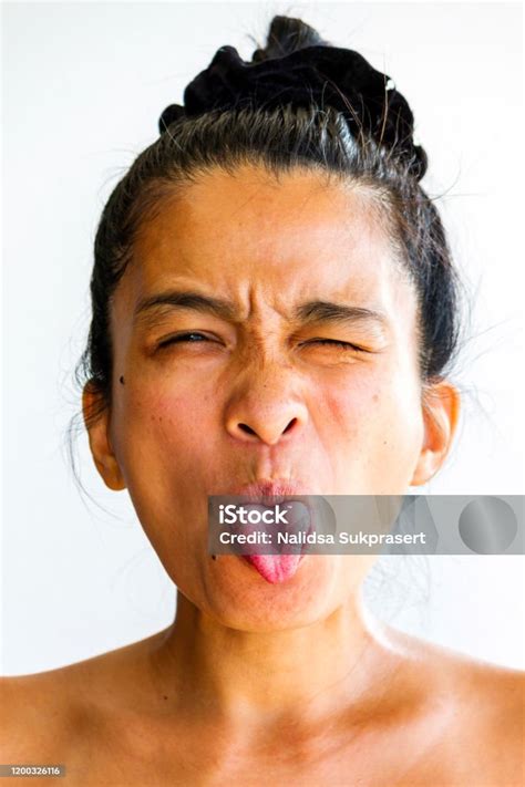 Woman Sticking Tongue Out Stock Photo Download Image Now Mole