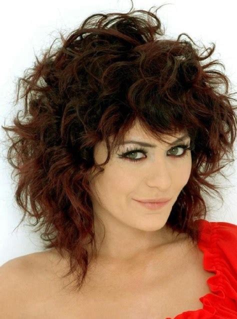 The side swept bangs, and the short curly hair leaves a stunning effect. Sensational Medium Length Curly Hairstyle For Thick Hair ...