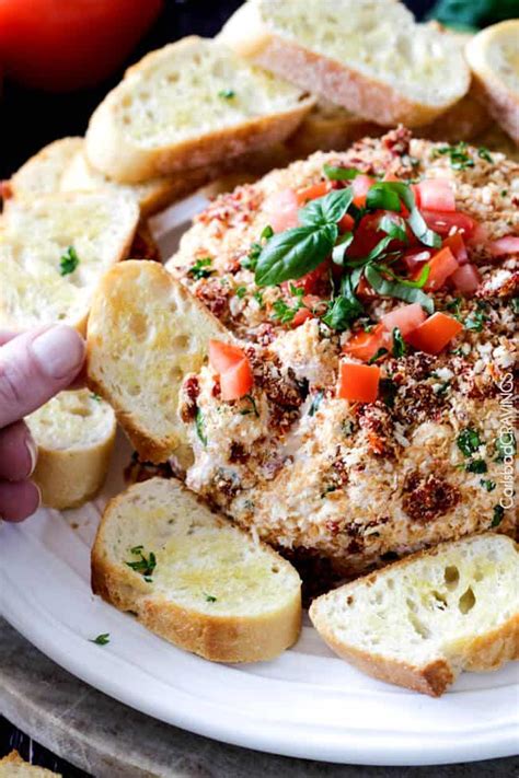 In a mixing bowl, combine the tomatoes, garlic, salt, pepper, basil, and olive oil and stir until everything is fully coated with olive oil. easy Bruschetta Cheese Ball (with Video!) - Carlsbad Cravings