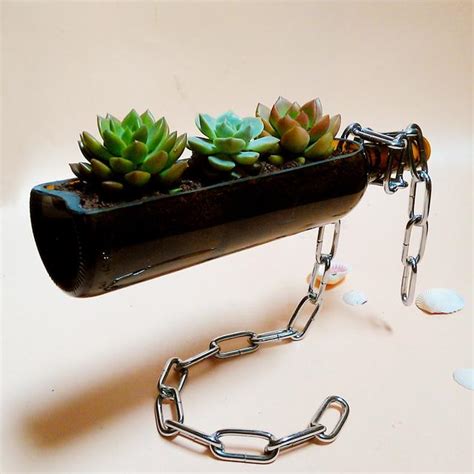 This paint absorbs light by day and glows by night! Creative home succulent flower pots, hanging beer bottles ...